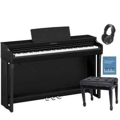 Piano digital Yamaha Clavinova Clp-825 con banqueta regulable en altura, auricular y libro de canciones.